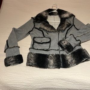 Chicos brand. only worn a handful of times. Very unique. Faux collar/cuffs.